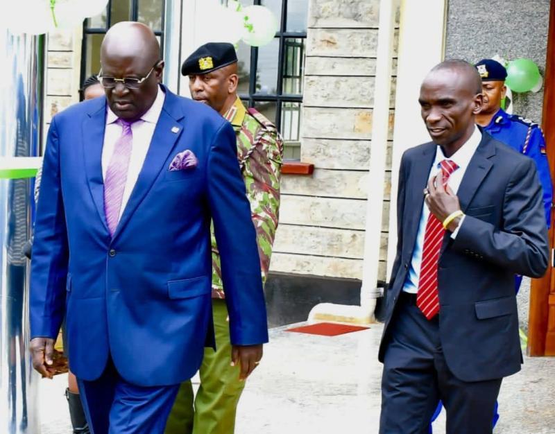 File image of George Magoha and Eliud Kipchoge.